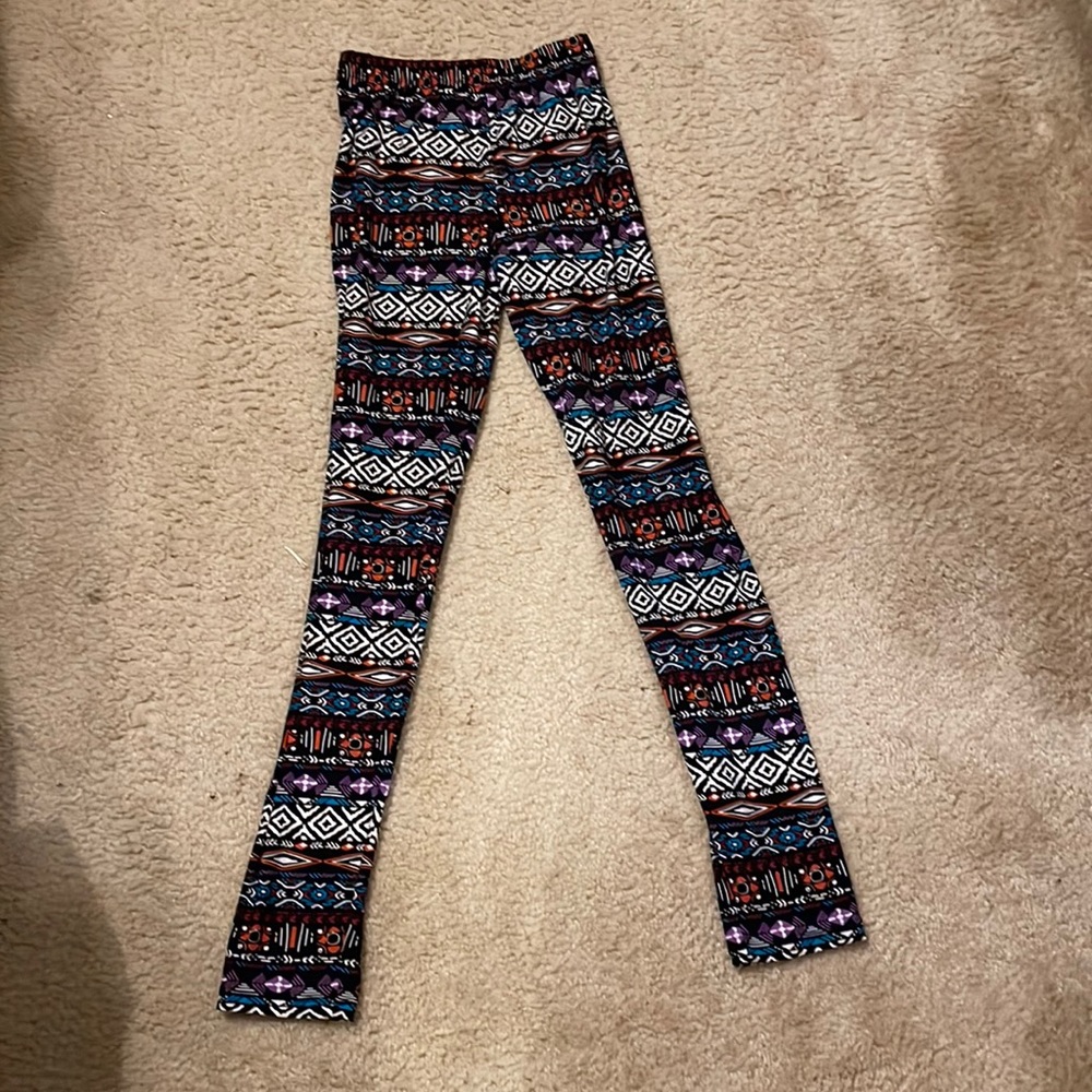Leggings / tights or under a skirt